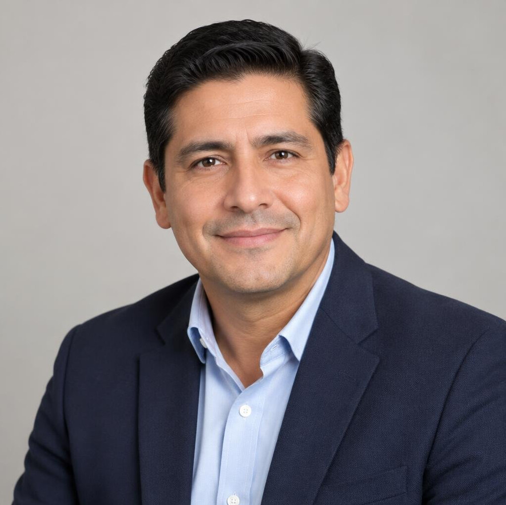 Portrait of a Mexican man in a blazer