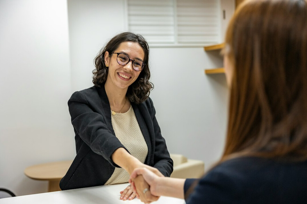 business meeting with eye contact